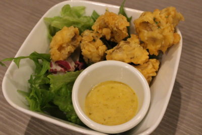Salad menu with tender fried fish and delicious mustard sauce