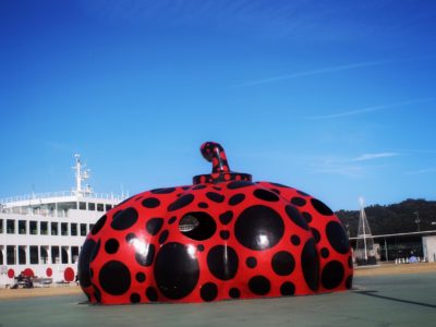 Giant-pumpkin sculpture in red polka-dot